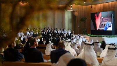 Dignitaries and guests attend the lecture by Dr Sinclair