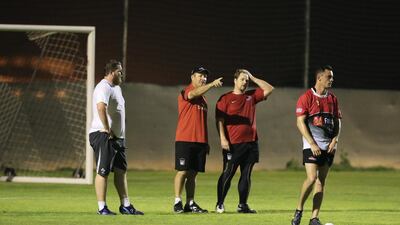 Roelof Kotze, second left, coaches the UAE national rugby team. Sarah Dea / The National