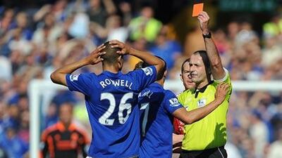 Everton’s Jack Rodwell was shown a red card by Martin Atkinson, right, in last weekend’s game against Liverpool. The card was later rescinded, but Atkinson still refuses to acknowledge that he was wrong.
