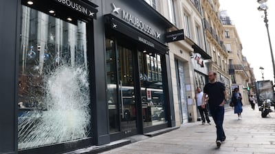 Damaged windows at the Mauboussin store at Rue de Rivoli in Paris. Reuters