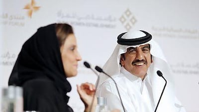 Diana Hamade moderates a panel featuring Mohi-Din BinHendi at the Arab Women Leadership Forum in Dubai last week. Sarah Dea / The National