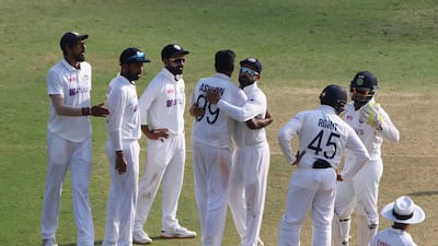India spinner Ravichandran Ashwin celebrates after bowling England's Jofra Archer for five.