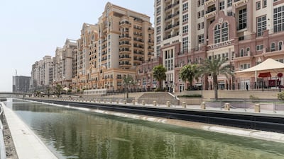Dubai Sports City residents say stagnant water in under-construction canal, which runs through the community, is creating a build up of mosquitoes and flies on residential balconies. Antonie Robertson / The National