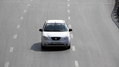 A Tiba car manufactured by Saipa group drives in northern Tehran. AFP