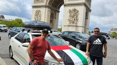In front of the Arc de Triomphe, Paris