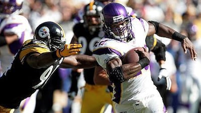 A judge tentatively set a Dec. 1 trial date for Minnesota Vikings running back Adrian Peterson on a charge of felony child abuse for using a wooden switch to discipline his 4-year-old son earlier this year. REUTERS/Jason Cohn