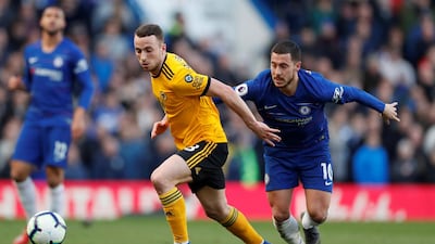 Wolverhampton Wanderers' Diogo Jota, left, in action with Chelsea's Eden Hazard. Reuters