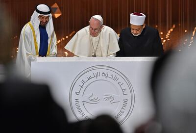 President Sheikh Mohamed, Crown Prince of Abu Dhabi at the time, watches Pope Francis and Dr Ahmed Al Tayeb, the Grand Imam of Al Azhar. AFP