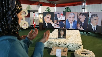 A woman prays at the grave of assassinated former Lebanese prime minister Rafik Hariri in downtown Beirut. Mohamed Azakir / Reuters
