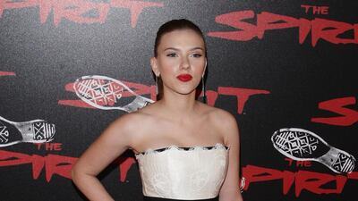 Scarlett Johansson, in a strapless midi, attends 'The Spirit' premiere on December 9, 2008 in Paris, France. Getty Images