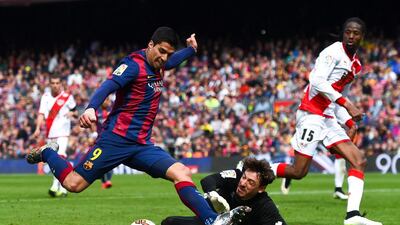 Luis Suarez of Barcelona scores his team's sixth goal in a 6-1 La Liga victory over Rayo Vallecano at the Camp Nou on Sunday. David Ramos / Getty Images