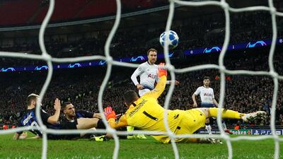 Christian Eriksen scores their winner past Inter Milan's Samir Handanovic. REUTERS
