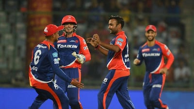 Amit Mishra, right, celebrates after he dismissed Kings XI Punjab batsman Manan Vohra. Sajjad Hussain / AFP