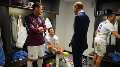 Prince William speaks to England players Frank Lampard and Jack Wilshere after their international friendly on Friday. Michael Regan / Getty Images / May 30, 2014