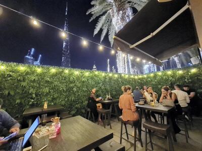 Distillery has an outdoor terrace with limited seating and views of the Burj Khalifa. Courtesy Distillery