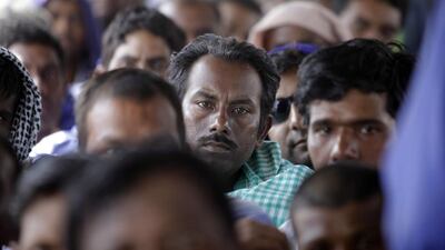 Labours return to work on Reem Island after their noon to 3pm summer break in Abu Dhabi. September 14, 2013. Sammy Dallal / The National