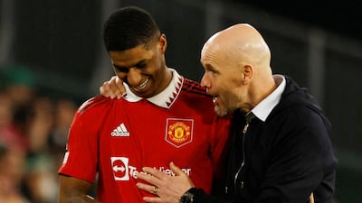 Manchester United manager Erik ten Hag with Marcus Rashford. Reuters