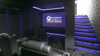 In home cinema. The basement includes a six seater home cinema with snazzy special effects including integrated 4DX meaning that your seat vibrates along with the action of the movie. Each seat includes an integrated drinks cooler. Mona Al Marzooqi / The National ID: 19541 Reporter: Lucy Barnard Section: Business