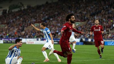 Mohamed Salah celebrates after ending his goal drought during Liverpool's 1-0 win over Huddersfield Town. Getty Images