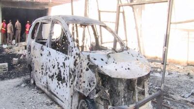 A damaged vehicle is seen following a raid by Saudi security forces on an ISIL cell in Riyadh. Saudi Press Agency/Handout via Reuters