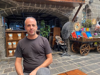 Ibrahim Polat has been serving breakfasts at the Palace Gate cafe since 2014, having previously worked as a chef and a waiter. Photo: Lizzie Porter / The National