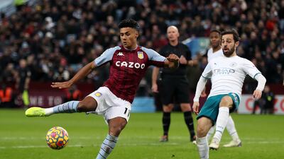 Aston Villa striker Ollie Watkins scores his side's goal against Manchester City. AP