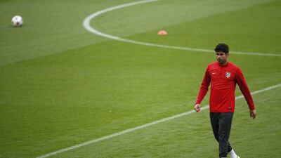 Atletico Madrid's Diego Costa leaves the pitch during a training session at Camp Nou stadium in Barcelona on Monday. Albert Gea / Reuters / March 31, 2014