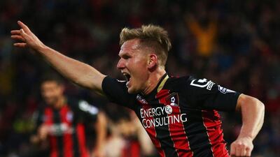 Matt Ritchie of Bournemouth celebrates as he scores their second goal in the Championship win over Bolton on Monday night to make Premier League promotion a virtual certainty. Clive Rose / Getty Images