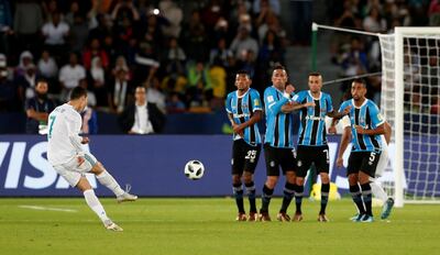 Real Madrid’s Cristiano Ronaldo scores with a thunderous free kick against Gremio. Matthew Childs / Reuters