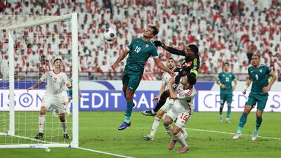 UAE goalkeeper Khalid Essa punches the ball. Chris Whiteoak / The National