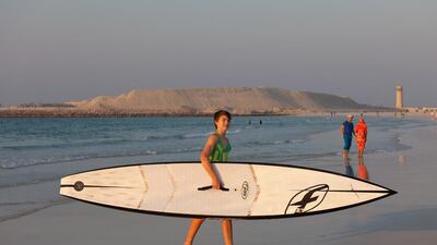 Thirteen-year-old British expat Guy Welchman is paddle-boarding around The World Islands in Dubai as part of a charity event to raise awareness about Type 1 Diabetes which Welchman has. Clint McLean / The National