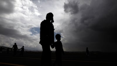 People walk towards Sanaa airport in Yemen during a prisoner exchange earlier this month. EPA