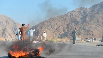Men shout anti-terrorist slogans after a suicide bomber killed 68 protesters in Afghanistan's Nangarhar province on September 11, 2018. AP Photo