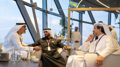 Sheikh Mansour bin Zayed, Sheikh Nahyan bin Zayed, and Sheikh Khaled bin Mohamed in Shams Tower. Photo: Mohamed Al Hammadi / UAE Presidential Court
