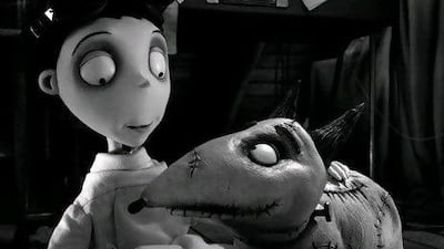 Victor, voiced by Charlie Tahan, left, and his pet Sparky in a scene from Frankenweenie. AP Photo