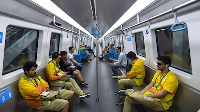 Rio 2016 volunteers travel on the new Metro line number 4 in Rio de Janeiro. The new Metro Line will initially only be available to Rio 2016 Olympic Games accredited people and ticket holders. Lukas Coch / EPA