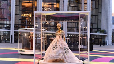 Outside, Lincoln Square was filled with previous Alta Moda pieces in glass cabinets. Courtesy Dolce & Gabbana