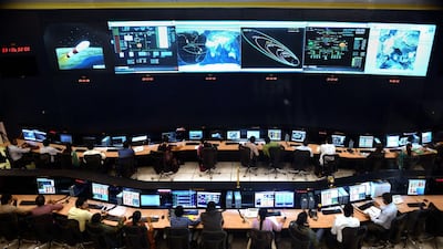 Indian scientists and engineers from the Indian Space Research Organisation monitor the Mars Orbiter Mission at the ISRO telemetry, tracking and command centre in Bangalore. Manjunath Kiran / AFP Photo