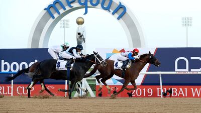 Plus Que Parfait, ridden by Jose Ortiz, wins the 2019 UAE Derby during the Dubai World Cup at Meydan Racecourse. Chris Whiteoak / The National