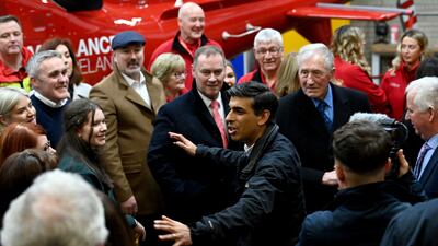 Rishi Sunak during a visit to Air Ambulance Northern Ireland at their headquarters in Lisburn. PA