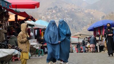 Afghan women at a market in the Fayzabad district of Badakhshan province on January 23. AFP