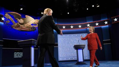 Readers give diverse opinions on the American presidential debate. Brendan Smialowski / AFP