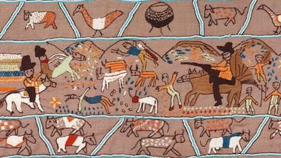 A scene showing European settlers killing people and cattle on the Keiskamma Tapestry, which sits in the South African Parliament building, where a fire has put the artistic masterpiece in danger. All photos: Keiskamma Trust