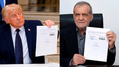 US President Donald Trump and Iran's President Masoud Pezeshkian hold up copies of the Memorandum of Understanding signed on June 17 to pause hostilities between their countries and work towards a peace agreement over 60 days. EPA / White House