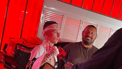 Britain's former featherweight world champion Prince Naseem Hamed, right.