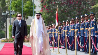 Egyptian president Abdel Fattah El Sisi and Saudi Arabia's King Salman review the honour guards in Cairo on April 7, 2016. Saudi Press Agency/Handout via Reuters