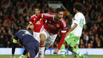 Chris Smalling begins to celebrate after scoring Manchester United's second goal in their 2-1 win over Wolfsburg in the Champions League on Wednesday night. Lee Smith / Action Images / Reuters