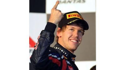 Sebastian Vettel celebrates his third grand prix victory in a row in Melbourne on Sunday. Joe Castro / EPA