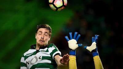 Sporting’s Uruguayan defender Sebastian Coates heads the ball during a Portuguese Liga Nos match against Vitoria Guimaraes in Lisbon. Patricia de Melo Moeira / AFP Photo