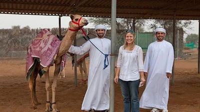 The one on the left. Hamad Al Khatri and his brother stand beside Mahloul on her first birthday
